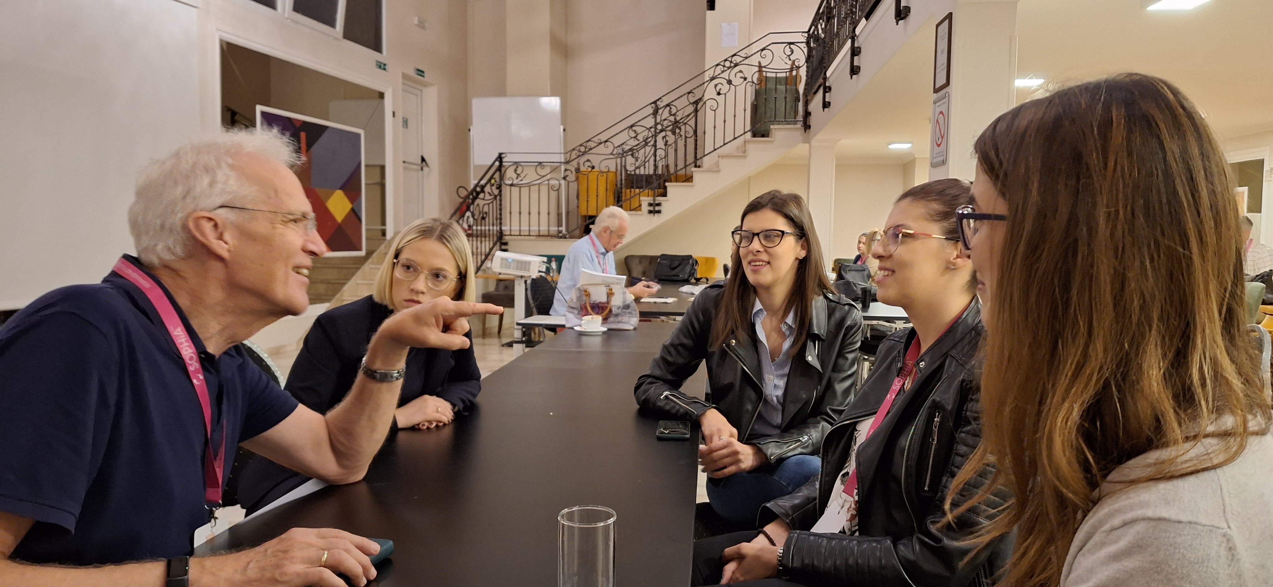 Phd Students Discussing With Rene Bernards