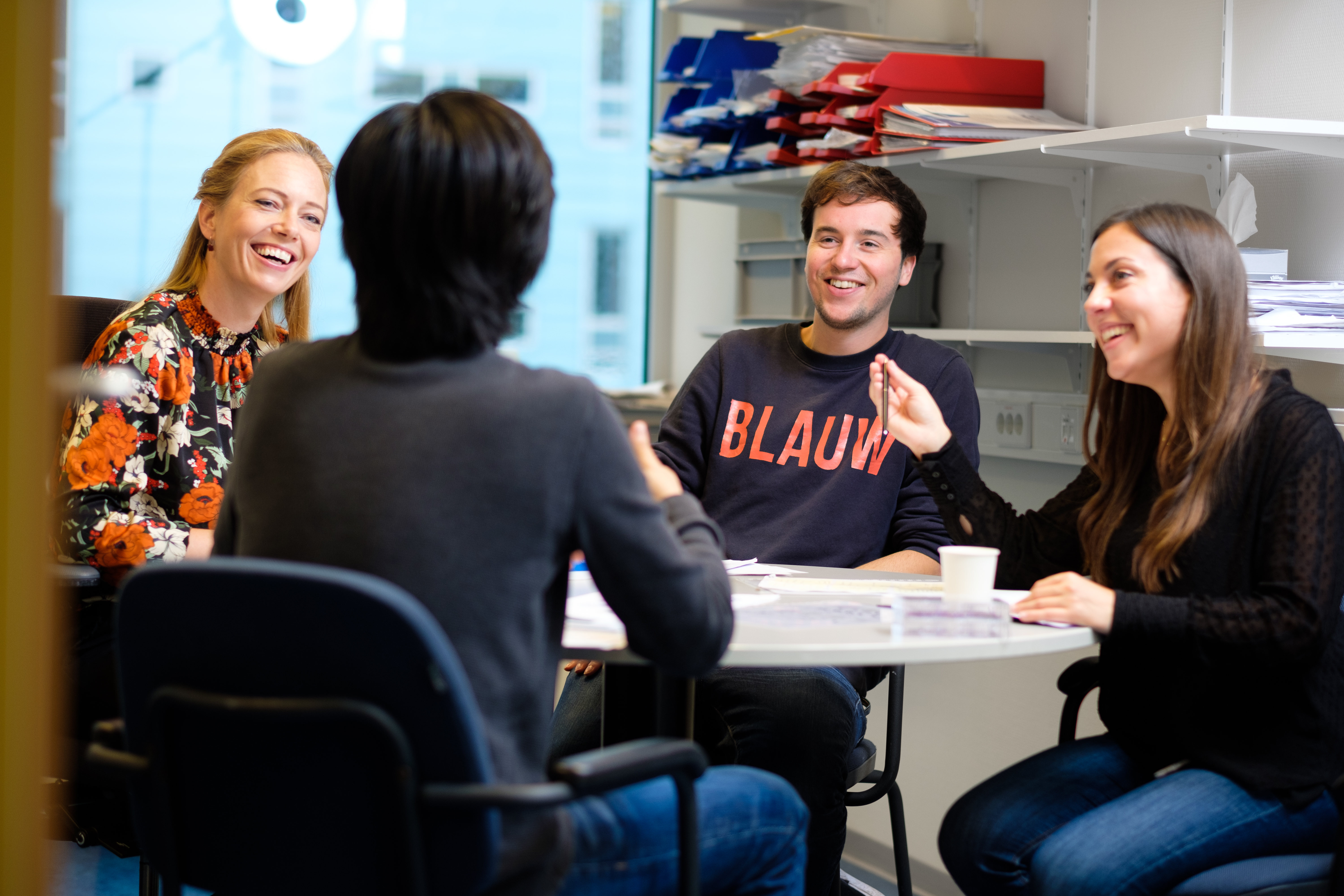 <p>Jacqueline Jacobs (left) in discussion with several group members.</p>